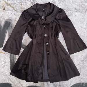 Whimsigoth black satin babydoll jacket flared sleeves and pleats